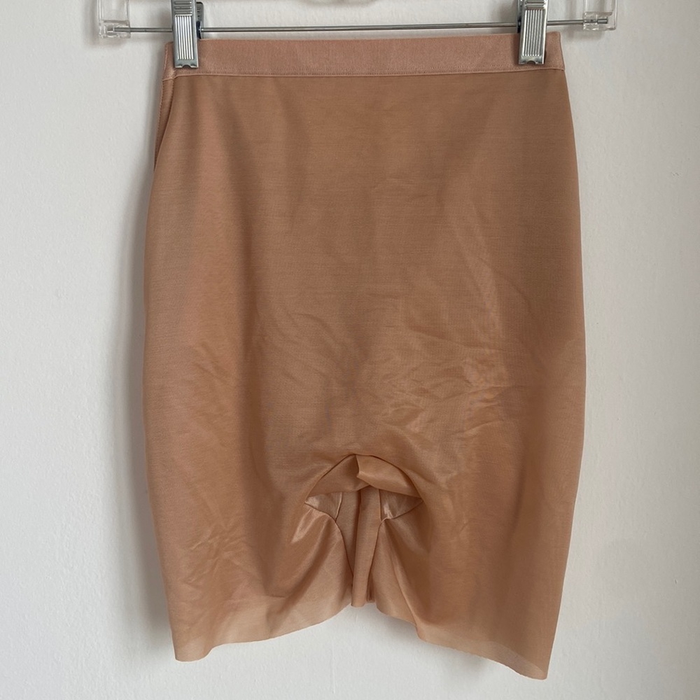 Skims barely there low back short. NWT